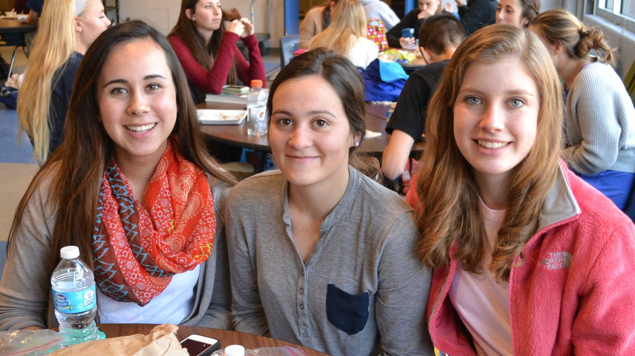 Seniors Isabella Toni, Cece McCarthy and Jordan Proctor find time to relax during lunch.