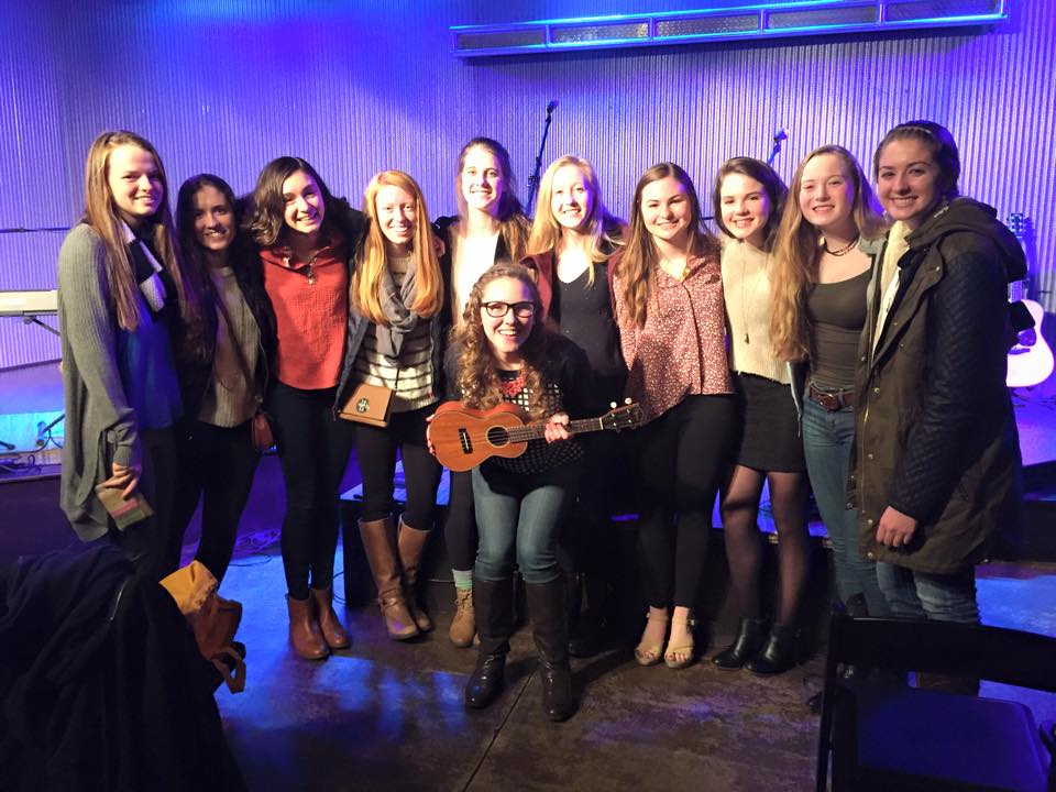 A group of Yorktown seniors support Claire during a show at Ebenezers Coffeehouse in D.C.