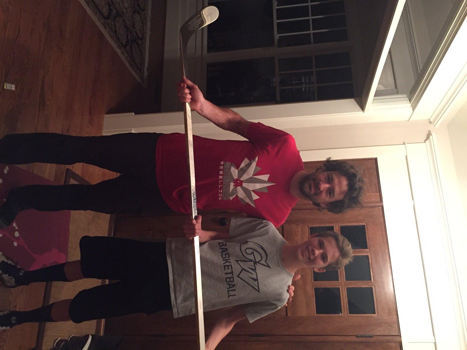 Sentry staff reporter Topher Wagner (right) and Washington Capitals right winger Justin Williams (left)