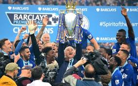 Leicester City hoists the Premier League Trophy, celebrating the teams unlikely victory