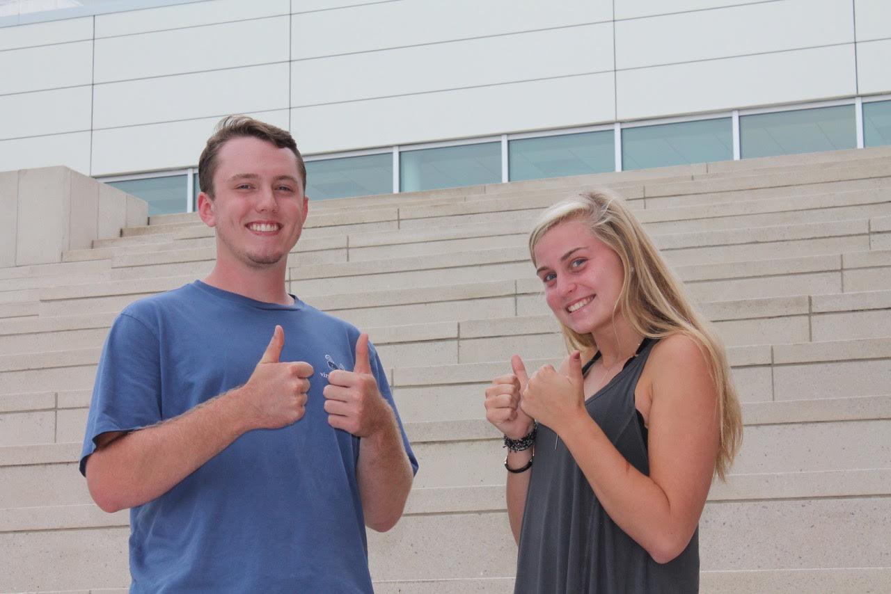 Lindsey Bowers and Ben Stoffel give the camera a thumbs up.