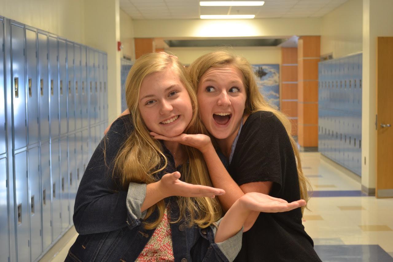 Caroline Boda and Maddie McNamee being silly in the hallway.
