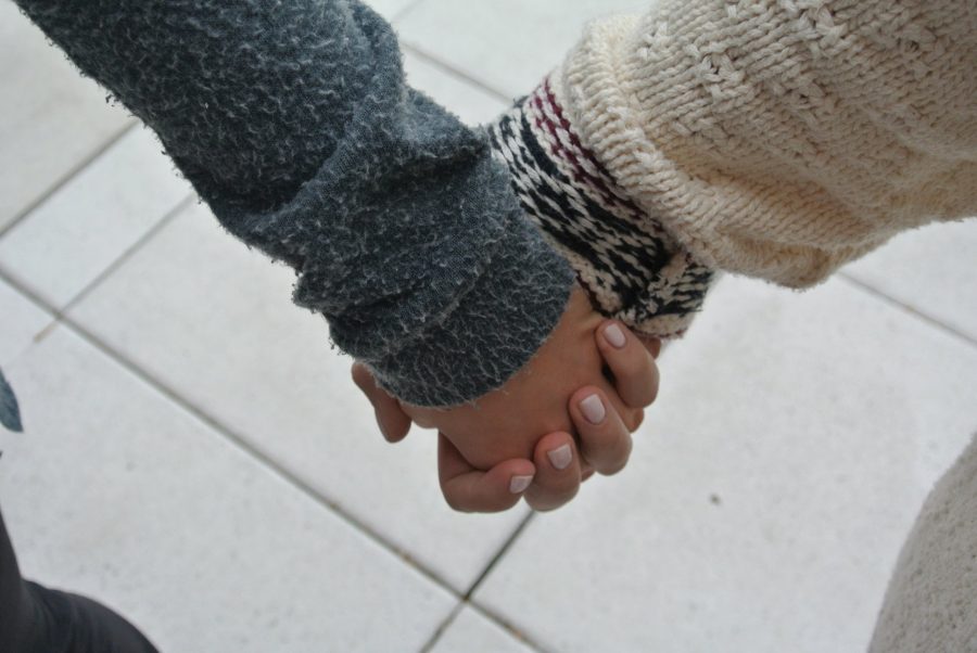 It isnt uncommon to see people holding hands around school during the holiday season