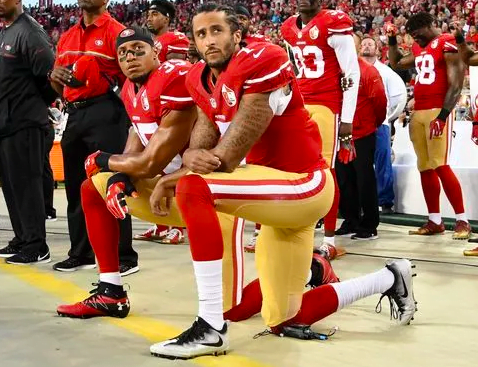 Colin Kaepernick took a knee during the national anthem to protest police brutality. 