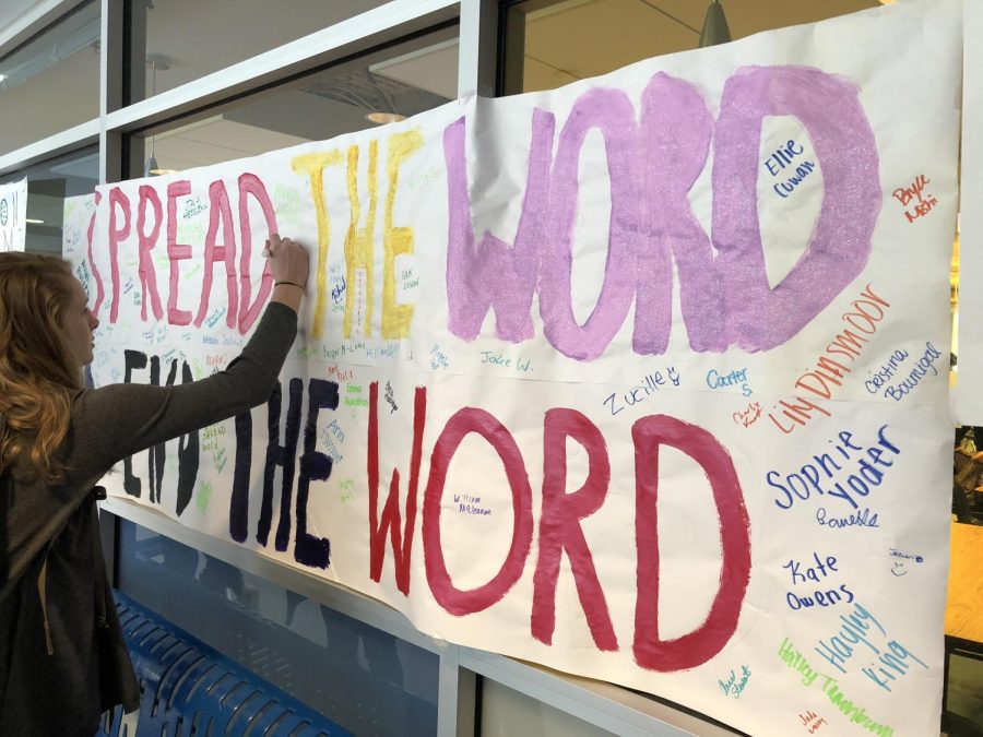 Students signed a banner to symbolize taking the pledge