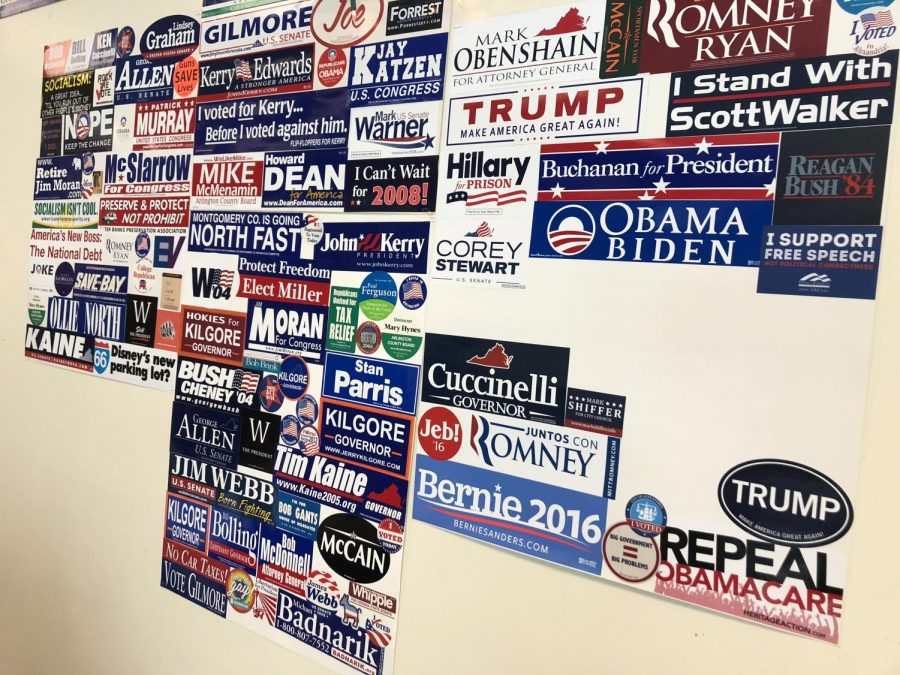 A classroom displays many political bumper stickers. 