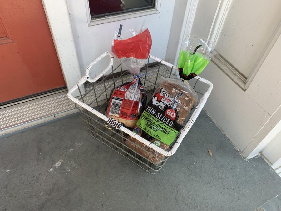 Food set outside on the porch for collection. 