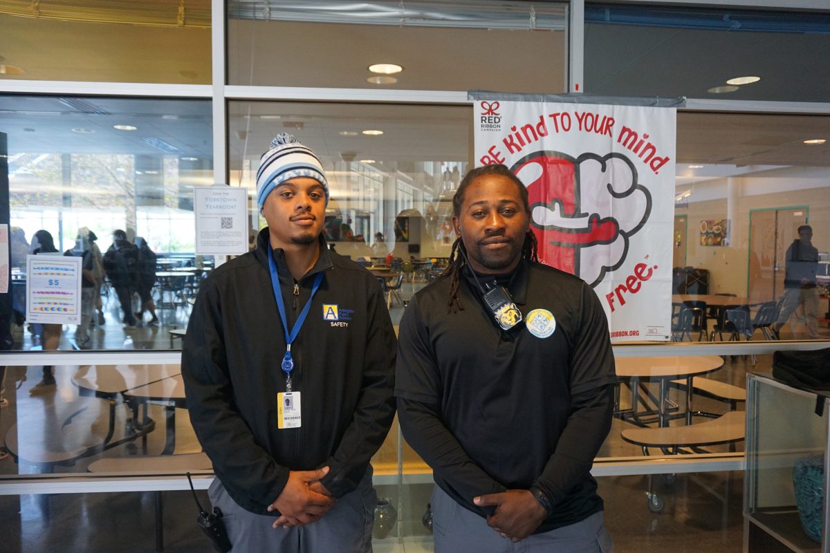 Maceo Carter-Ways Jr. and Captain posed in front of our schools cafeteria.