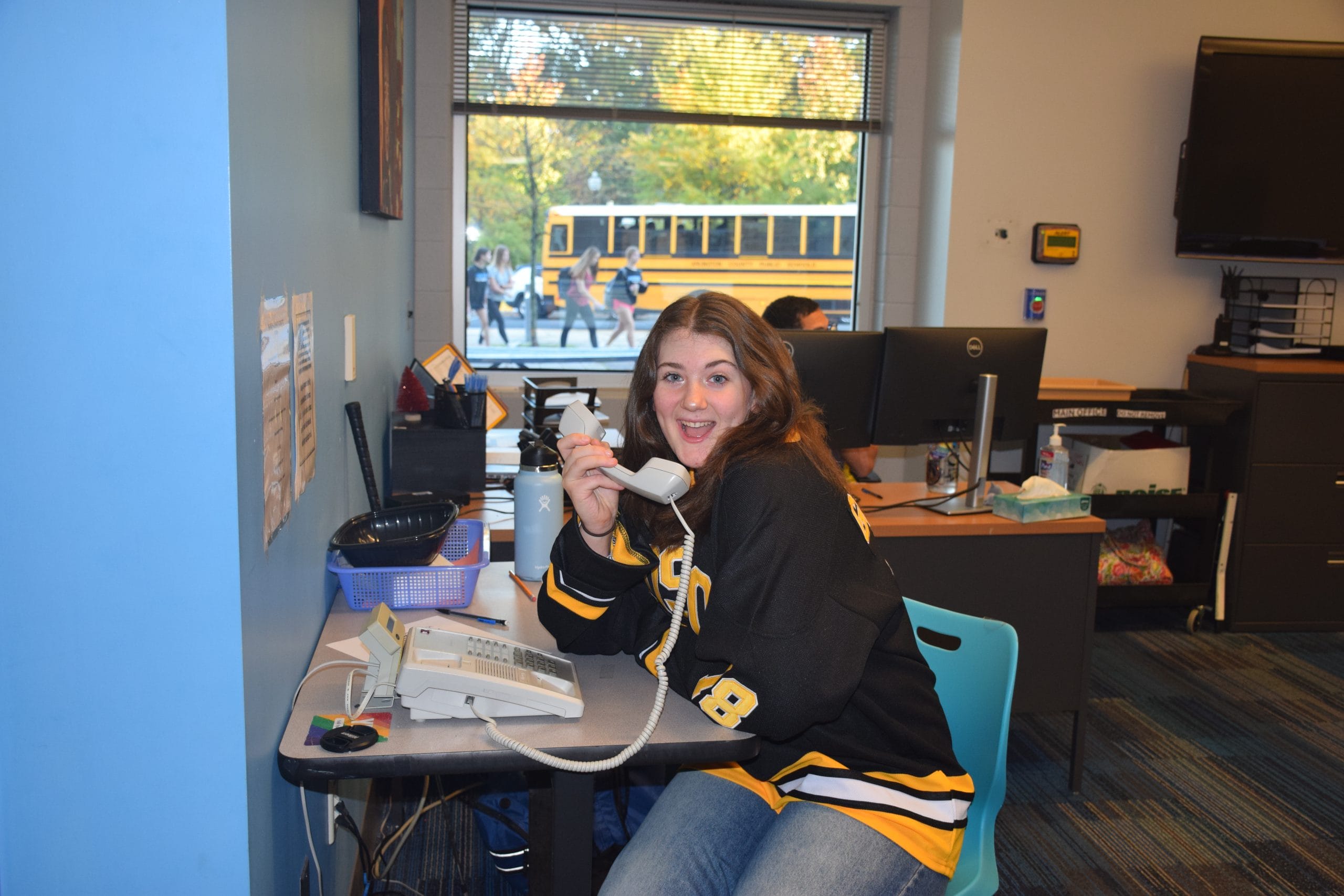 Carson Knowles, showing enthusiasm as she is preparing to give the morning announcements.