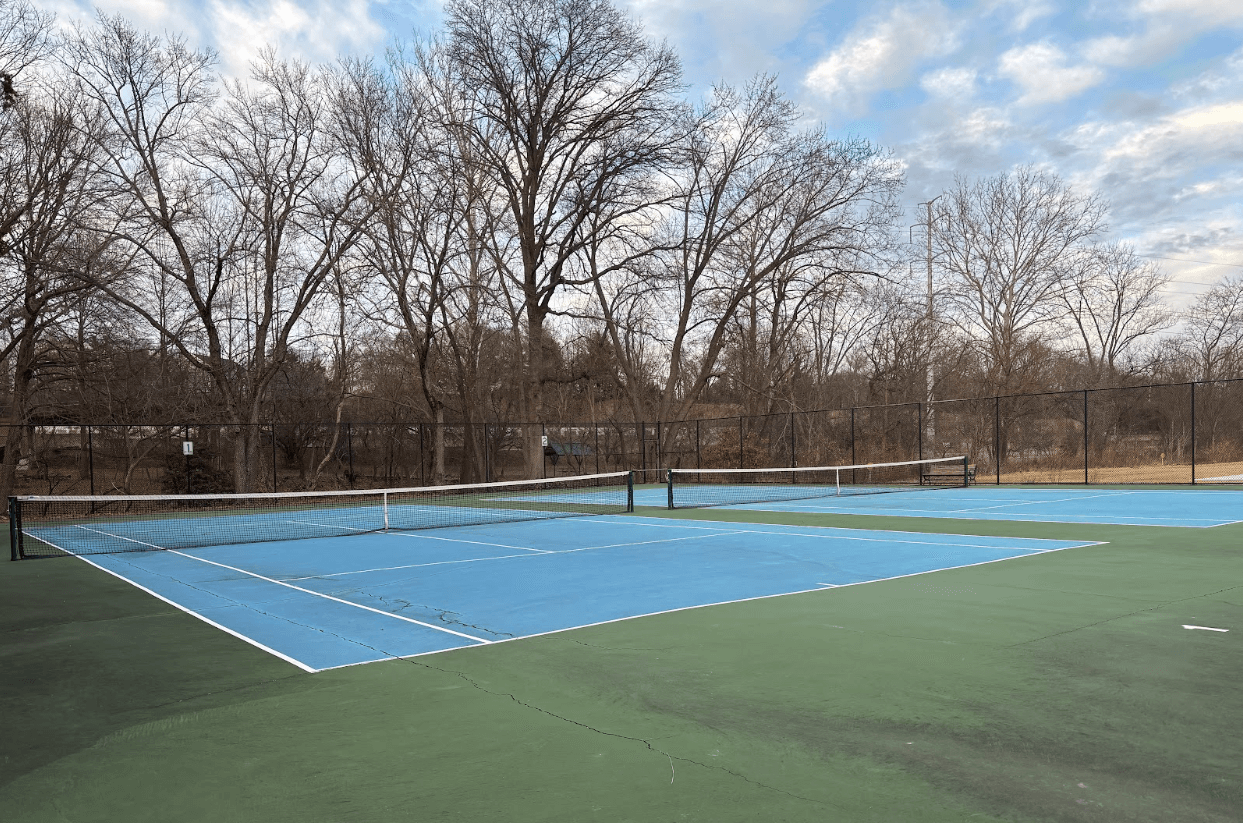 Madison Manor tennis courts, a popular spot for avid tennis and pickle ball players.